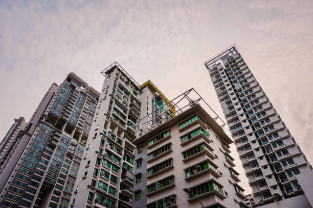 Buildings in singapore, skycrapers, tall building shot with cloudy sky in the background