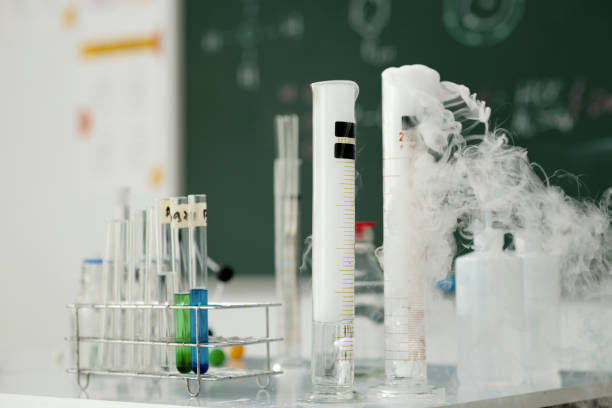 istock Scientific Glassware Beside Steaming Experiment on Desk 2170926011