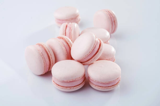istock Pink colored. Bunch of macarons on the white surface 2170926326