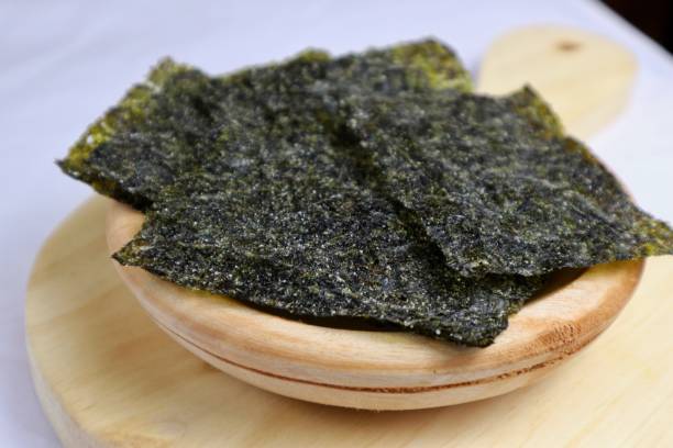 istock Korean Seaweed salted laver nori sheets on plate 2170926408