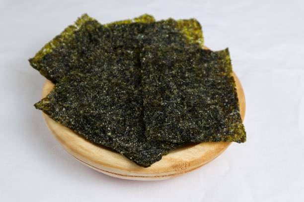 istock Korean Seaweed salted laver nori sheets on plate 2170926416