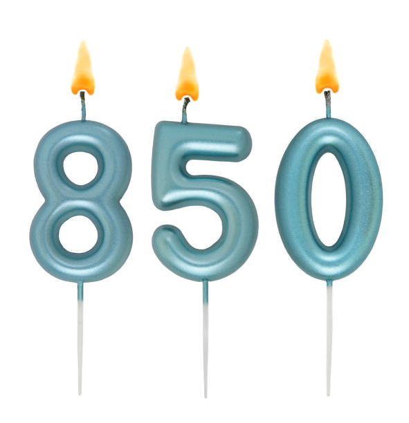 Blue birthday candles isolated on white background, number 850