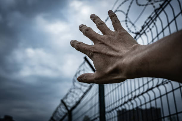 istock Hoping freedom life,Hand reaching for the sky 2170928089