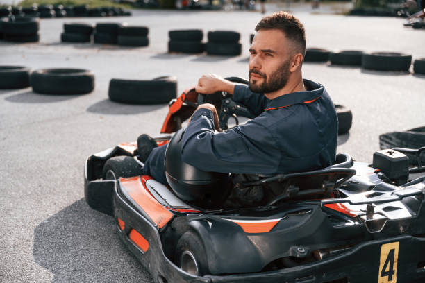 istock Ready for the competition, driving. Man is outdoors, kart racing conception 2170930245