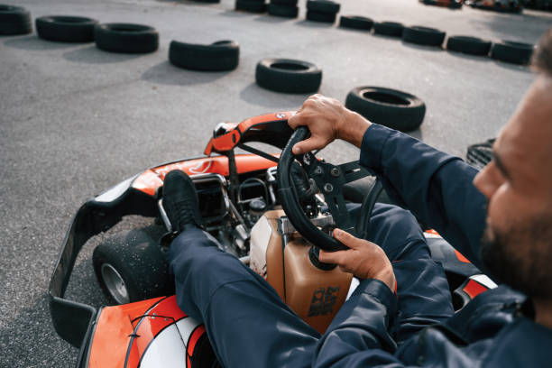 istock Parked, driving out. Man is outdoors, kart racing conception 2170930283