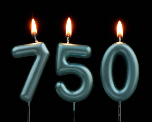 istock Blue birthday candles isolated on black background, number 750 2170930850
