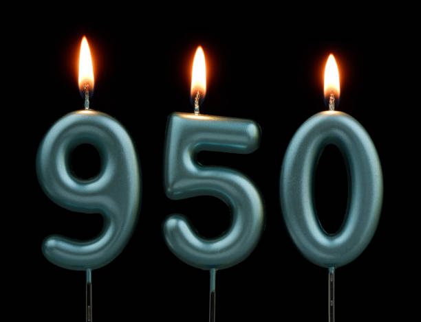 istock Blue birthday candles isolated on black background, number 950 2170930851