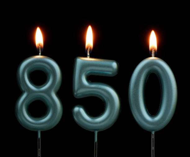 istock Blue birthday candles isolated on black background, number 850 2170930855