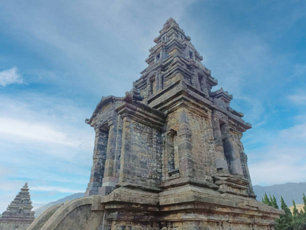 istock The ancient monument of Arjuna Temple in Dieng, Central Java. against a blue sky background 2170931866