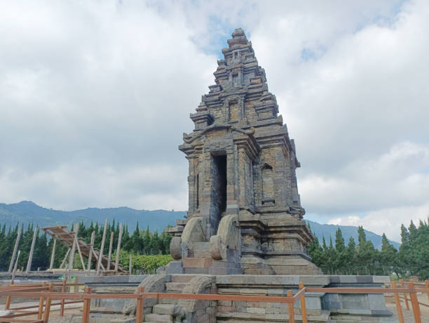 istock The ancient monument of Arjuna Temple in Dieng, Central Java. against a blue sky background 2170932027