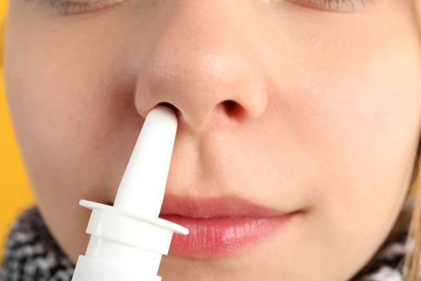istock Young woman using nasal drops, close up 2170933232