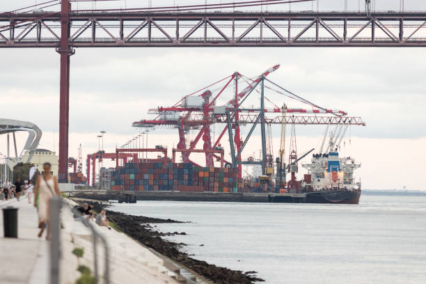 istock Cargo seaport in daylight and promenade 2170934699