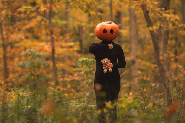 portreit happy children preparing for Halloween. child with halloween pumpkin.