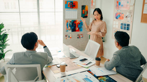 istock UX and UI Designers Presenting New Concepts in a Modern Office Setting During a Creative Meeting 2170938116