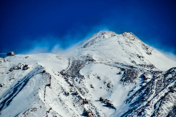 istock A mountain covered in snow with a blue sky in the background 2170938965
