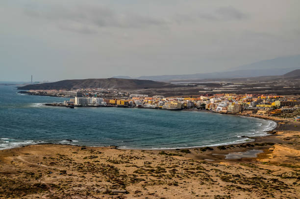 istock A beach with a small town in the background 2170939006