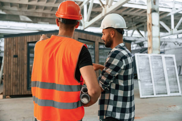 istock Two workers are in the industrial wooden warehouse 2170939820