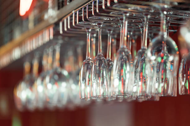 istock Hanging champagne glasses at the bar 2170942904