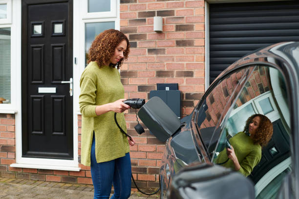 istock charging the car at home 2170943304