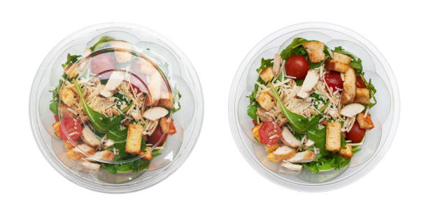 istock Salad in disposable bowl isolated on a white background 2170943404