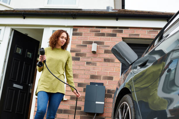 istock charging the car at home 2170943506