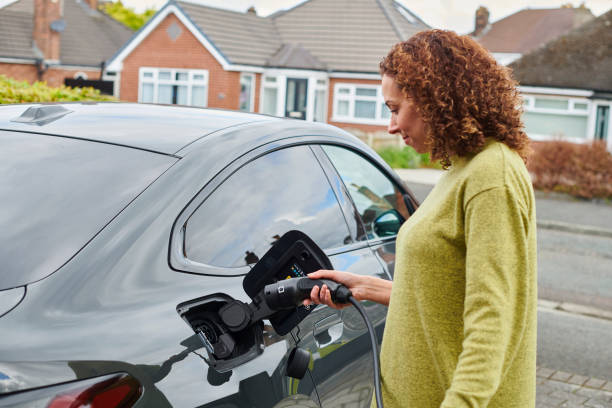 istock charging the car at home 2170943559