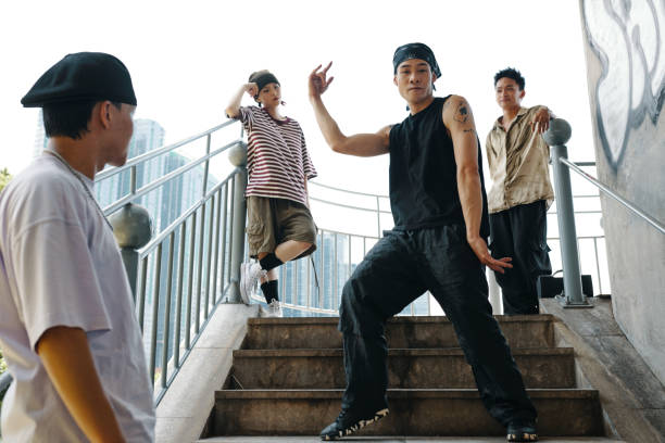 istock Dancing Group of Young Men on Urban Staircase 2170945955