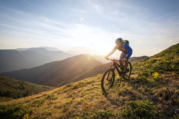 istock Mountain biker riding downhill in mountain. 2170946362