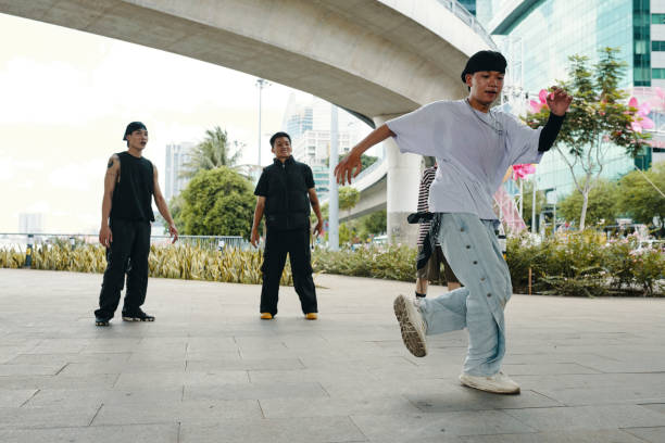 istock Practicing Street Dance Moves in Urban Setting 2170948452