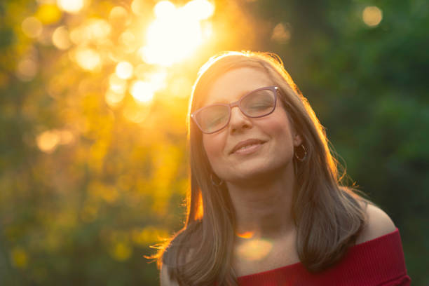 istock Woman bathing in sunlight in the forest 2170948766