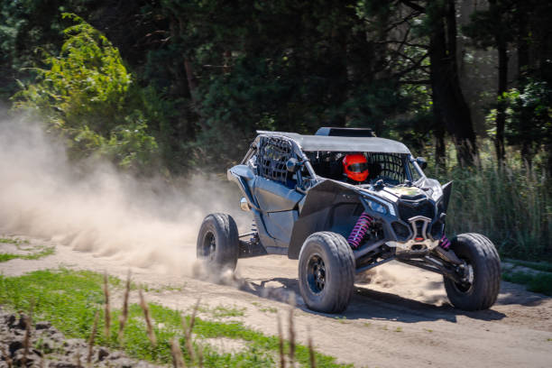 istock UTV buggy, 4x4 competition on dusty road. Rally, extreme, adrenalin 2170951450