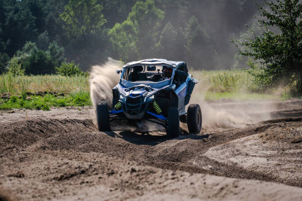 istock Cool view on UTV, rally, 4x4 riding in dusty track. Amateur competitions 2170951467