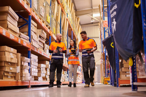 istock warehouse team walking in the aisle 2170952387