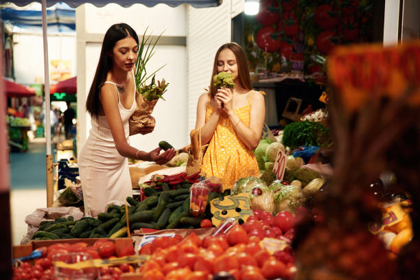 istock Two women are together on the marker or bazaar 2170955437