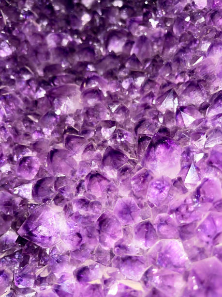 istock Texture of natural amethyst crystals. Natural background. 2170955860