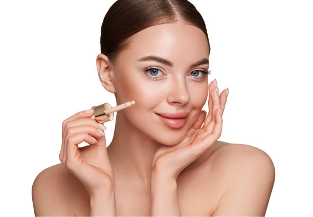 istock Portrait beautiful young woman with foundation bottle 2170957717