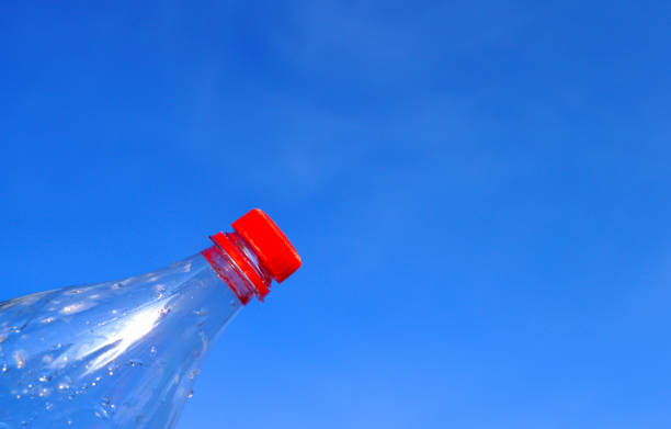 istock Plastic bottle on blue sky background. Plastic recycling and waste collection. 2170958871