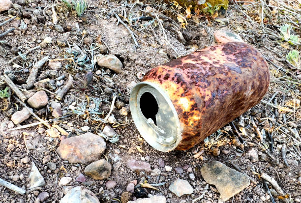 istock Rusty can. Abandoned Crumpled a empty beer can on ground. 2170961348