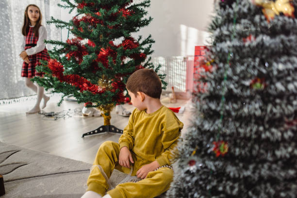 istock Boy with developmental disability enjoying Christmas Decor at Home 2170963191