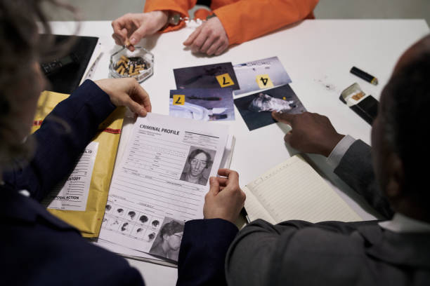 istock Discussing Case Files During Criminal Investigation 2170970677