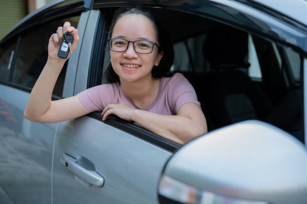 istock Asian Female Purchase New Car 2170970942