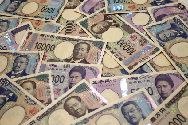 istock Japanese Yen banknote background 2170972380