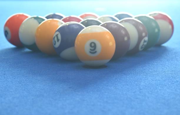 istock billiard ball with number arranging ready for playing on blue pool table 2170972601
