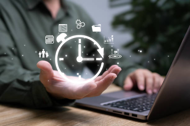 istock Time management, Business schedule plan concept, Businessman show virtual clock and timeline business work plan, Work planning increases efficiency and reduced work time, Optimize performance success 2170981985