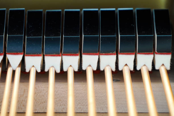 istock acoustic grand piano strings detail close up 2170983152