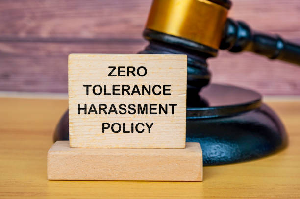 istock Zero tolerance harassment policy text written on wooden board with lawyer's gavel background 2170987006