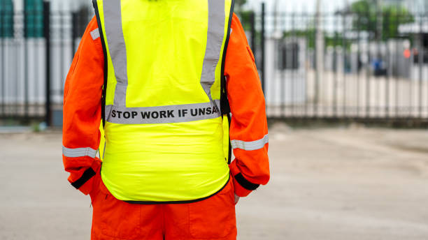 istock A crane signaler with fully safety PPE uniform. 2170987447
