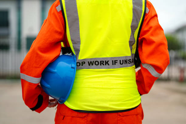 istock A crane signaler with fully safety PPE uniform. 2170987474