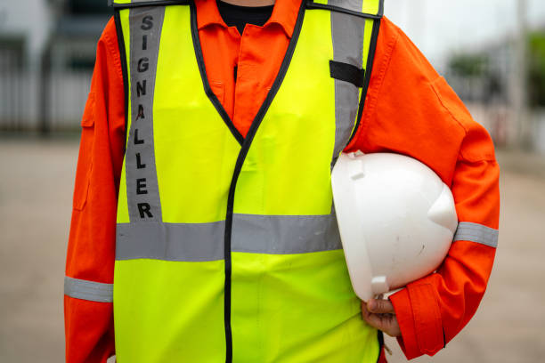 istock A crane signaler with fully safety PPE uniform. 2170987475