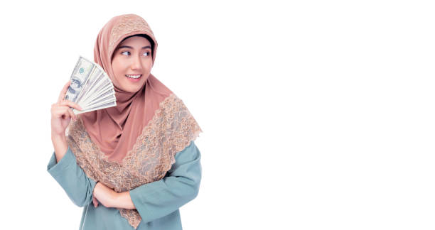 istock Muslim Woman Holding Cash 2170993314